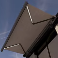 Modern Exterior Awning On Gray Building With LED Strip Lights And Blue Sky