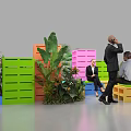 Colorful Landscape Seats With People Relaxing And Green Plants In Public Area