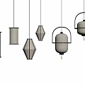 Various Style Pendant Lights With Fabric Shades And Black Metal Frames On Dark Wall