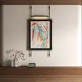 Vibrant Abstract Painting With Colorful Lines And Shapes In Black Frame Hanging On White Wall
