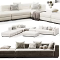 Beige Fabric Double Sofa With Checkered Pillows Cozy Throw Blanket And Ottoman