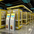 Indoor Playground Snack Area With Yellow Interior Glass Display Cabinets And Counter