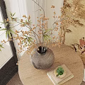 Decorative Vase With Dried Branches And Small Flowers On Round Wooden Table With Traditional Mural