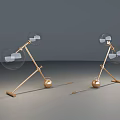 Modern Adjustable Desk Lamps With Golden Stands Transparent Shades And Spherical Bases
