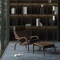 Brown Leather Leisure Chair With Wooden Frame And Footstool Near Dark Bookshelf And Floor Lamp