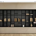 Modern Black Bookcase with Multiple Compartments Books Decorative Items Beige Wall and Wooden Floor