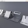 Modern Silver Metal Device Stands With Various Designs For Smartphones And Tablets