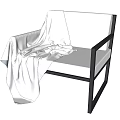 Comfortable Leisure Chair With Black Frame White Cushion And White Blanket