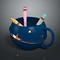 Blue Decorative Cup with Star Patterns and Gold Accents holding Colored Crayons