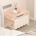 Elegant Modern Bedside Table With Pink Transparent Top White Scalloped Base Reed Diffuser And Cup 3d model