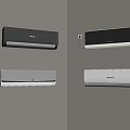 Four Black and White Haier Air Conditioners Mounted on Gray Wall