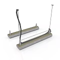Two Metal Base Units With Black Cable And Silver Rod Attachments
