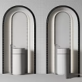 Two Cylindrical Marble Washbasins in Arched Doorframes with Sleek Metal Faucets