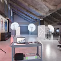 Modern Wedding Dress Store Interior With Photography Lights Tripods And Wedding Photo Displays Workstation
