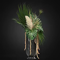 Lush Decorative Plant Arrangement With Monstera Palm Leaves And Pampas Grass And Hanging Elements