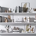 Decorative Ornaments Set With Books Sculptures Framed Leaf Art And Animal Figurines On Shelves