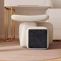 White Padded Stool on Round Rug with Dressing Table in Modern Bedroom