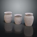 Three Handmade Textured Ceramic Vases On Black Smooth Surface With Reflection