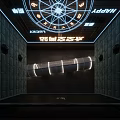Modern Time Space Art Gallery With Stone Walls Circular Neon Ceiling And Curved Installation