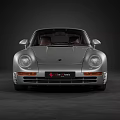 Silver Porsche Classic Sports Car With Sleek Body Design And Brown Leather Interior