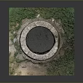 Ancient Circular Stone Well Structure With Rough Texture And Green Grass Around Base 3d model