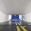 Parking Lot Entrance Featuring Illuminated Ceiling And Clear Directional Lane Markings