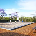People Playing Beach Volleyball On Outdoor Sand Court With Net And Benches