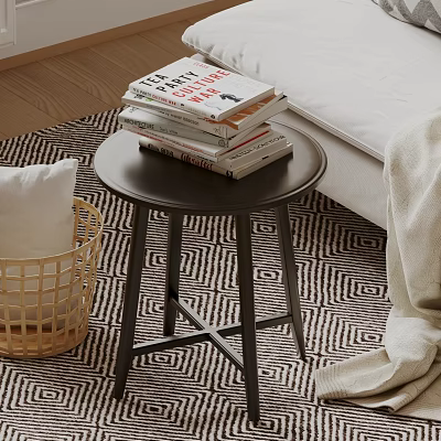 Modern Round Side Table With Stacked Books And Wicker Basket Near Bed On Patterned Rug 3d model