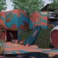 Colorful Kids Play Area With Wave Pattern Buildings Slides Trees And Vibrant Design