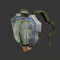 Detailed Decorative Metal Shield With Blue Silver Accents And Green Strap