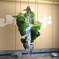 Hotel Lobby Bar With Hanging Rockery Waterfall Green Plants Mountain Water Characters And Beige Walls