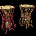 Two Traditional Musical Drums With Golden Painted Art And Red Brown Rope Decorations