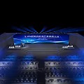 Bright Banquet Hall With Blue Backdrop Screen Podium Audience Seats And Lighting Effects For Conference
