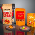 Assorted Spicy Snack Packaging Including Chilli Crab Cashew And Fruit Flavors