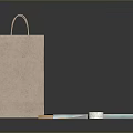 Brown Paper Bag With White Square Pads Yellow Blocks And Tape Roll