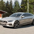 Audi Silver Luxury Sedan With Sleek Design And Scenic Outdoor Background