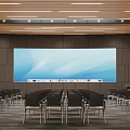 Modern Conference Room Interior With Large Projection Screen And Rows Of Chairs