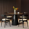 Elegant Round Negotiation Table With Four Chairs And Vase On Wooden Textured Walls
