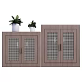Two Wooden Sideboards With Lattice Doors And Green Plants On Top