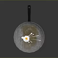 Metal Frying Pan With Freshly Fried Egg And Splatters For Kitchen Cooking