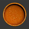 Artistic Orange Carved Bowl Sculpture With Textured Surface On Gray Background