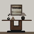 Wooden Console Table with Framed Artwork Table Lamp Decorative Items and Books Against Light Wall