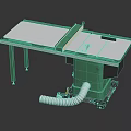 Green Industrial Table Saw With Silver Tabletop And Dust Collection Hose