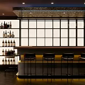 Modern Bar Interior Design With Sleek Counter Black Stools And Warm Ambient Lighting