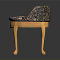 Classic Upholstered Stool Design With Floral Cushion And Curved Wooden Legs