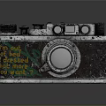 Vintage Electronic Camera Featuring Classic Lens Engraved Text and Retro Surface Design 3d model