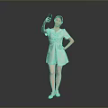 Woman Posing in Light Green Dress Taking Selfie with Mobile Phone Against Gray Background