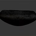 Hand Carved Dark Stone Bowl Shaped Sculpture With Textured Surface