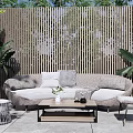Outdoor Sofa On Modern Patio With Wooden Slat Screen Large Plants Coffee Table And Chair