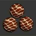 Spherical Sweet Desserts With Red And White Striped Cream In Brown Paper Cups
